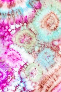 Fragment of bright pattern in tie-dye batik 스톡 사진