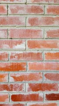 Fragment of the building wall - red bricks Stock Photos
