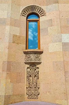 Fragment of carved wall with rectangular window Stock Photos