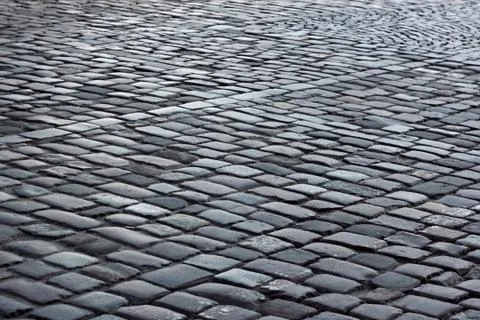 Fragment of cobbled road Stock Photos