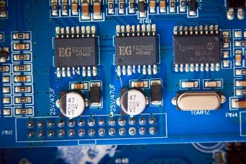 Fragment of a computer circuit board Stock Photos