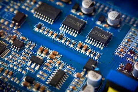 Fragment of a computer circuit board Stock Photos