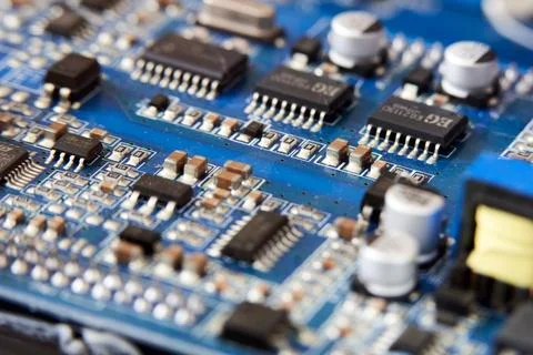Fragment of a computer circuit board Stock Photos