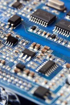 Fragment of a computer circuit board Stock Photos