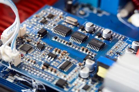 Fragment of a computer circuit board Stock Photos