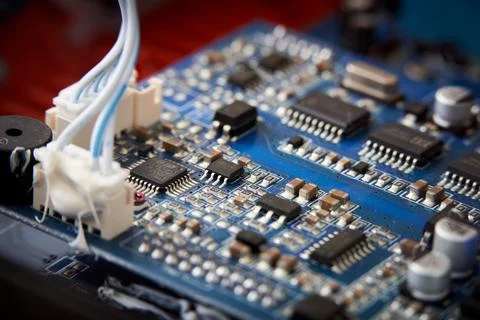 Fragment of a computer circuit board Stock Photos