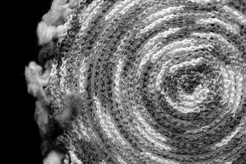 Fragment of a crocheted circle from melange threads based on a plastic canvas Stock Photos