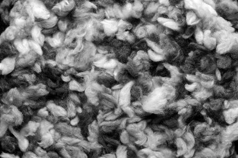 Fragment of a crocheted circle from melange threads based on a plastic canvas Stock Photos
