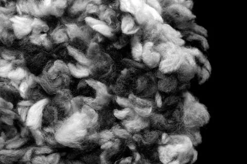 Fragment of a crocheted circle from melange threads based on a plastic canvas Stock Photos