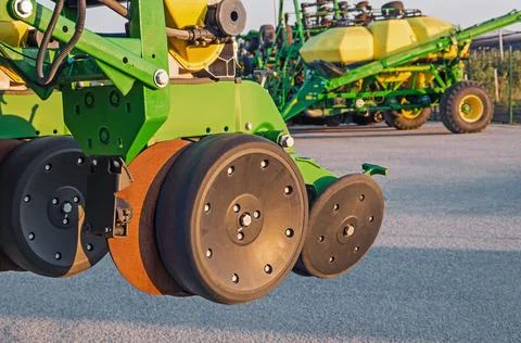 Fragment of device trailed seeder for forming furrows for placing seeds Stock-Fotos