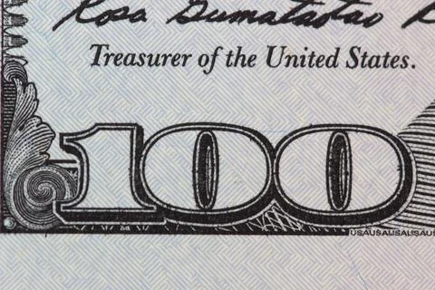 Fragment of dollar bill Stock Photos