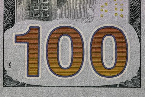 Fragment of dollar bill Stock Photos