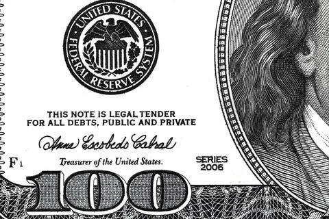 Fragment of dollar bill Stock Photos