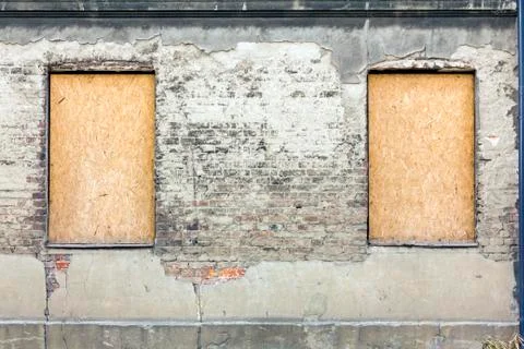 Fragment of facade of an old devastated building Stock Photos