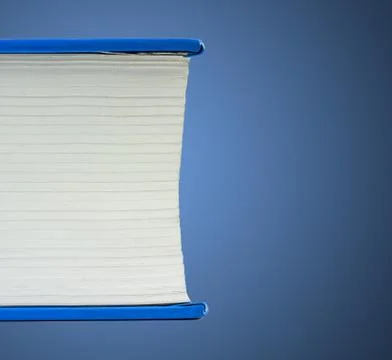 Fragment of a flat lying book Stock Photos