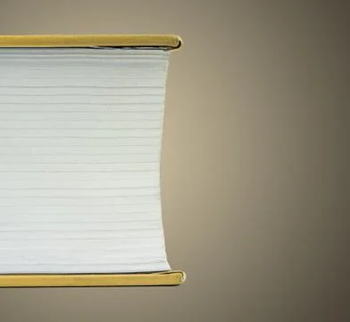 Fragment of a flat lying book Stock Photos