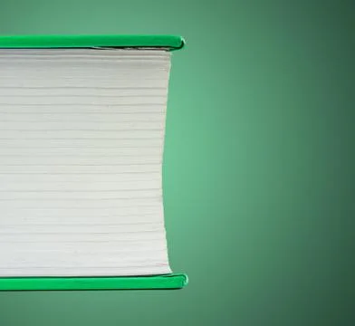 Fragment of a flat lying book Stock Photos