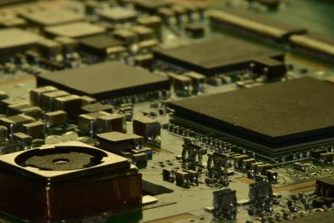 Fragment of frameless mounting of elements on the motherboard of the tablet.  Stock Photos