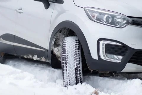 A fragment of the front of an SUV with headlights, front bumper, fog lights Stock Photos