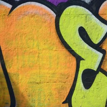 Fragment of graffiti drawings. The old wall decorated with paint stains in th Stock Photos