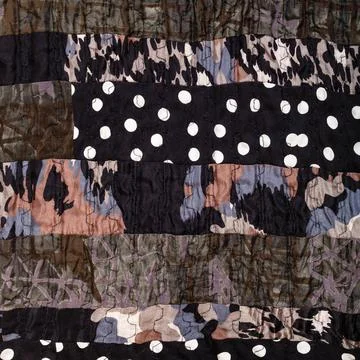 Fragment of handmade brown patchwork scarf fragment of handmade brown patc... Foto stock