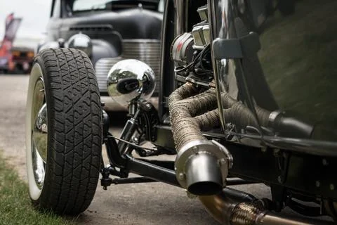 The fragment of a hotrod oldtimer, close-up.  Stock Photos