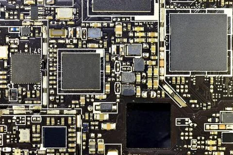Fragment of installation of uncased electronic components and microcircuits i Stock Photos