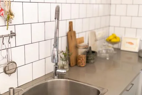 Fragment of a kitchen worktop with sink Stock Photos