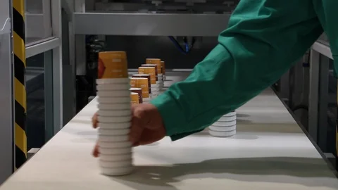 A fragment of a machine for the production of disposable plastic cups. Stock Footage 129879162