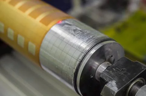 A fragment of the machine for sticking flexo forms on the cylinders of the Stock Photos