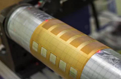 A fragment of the machine for sticking flexo forms on the cylinders of the Stock Photos