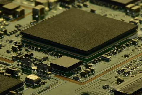 Fragment of modern assembly of electronic elements on a printed circuit board Stock Photos