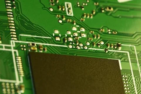 Fragment of modern assembly of electronic elements on a printed circuit board Stock Photos