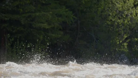 Fragment of a muddy mountain river. River spray bounces Stock Footage 126993082