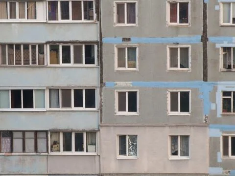 Fragment of a multi-storey building of Soviet architecture Stock Photos