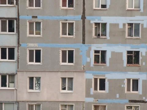 Fragment of a multi-storey building of Soviet architecture Stock Photos