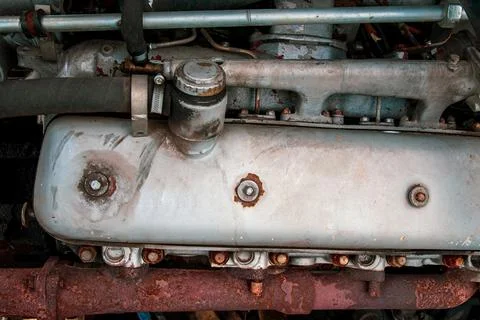 A fragment of an old combine engine in close-up Stock Photos