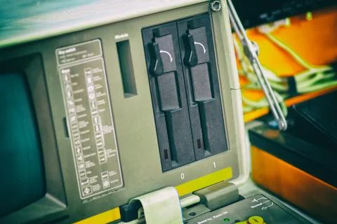 Fragment of an old computer with five-inch floppy drives, close-up Stock Photos