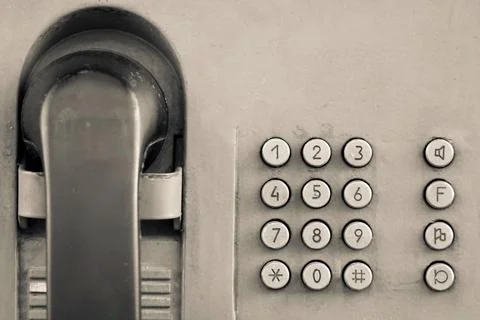 Fragment old payphone with push button closeup Foto stock