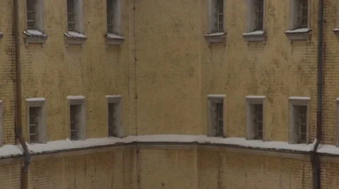 Fragment of old prison building in winter Stock Footage 67533557