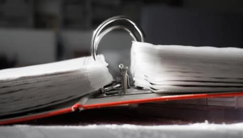 Fragment of an open folder with files. Close-up Stock Photos
