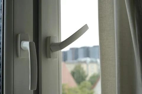 Fragment of open window pvc frame. ventilation of the room Stock Photos