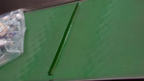 Fragment of the packaging process for small parts of furniture fittings. Stock Footage 143490836