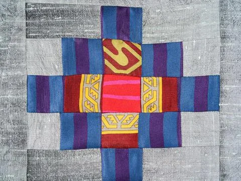 Fragment of patchwork cloth with silver fabric Stock Photos