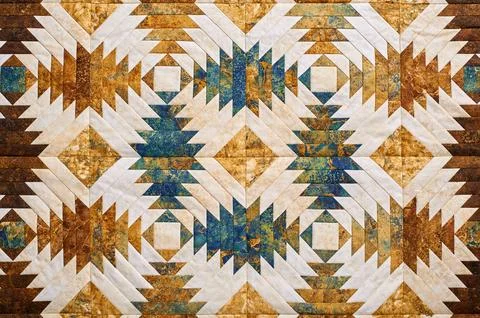 Fragment of quilt stitched from pineapple pattern blocks, traditional patchwo Fotos de archivo