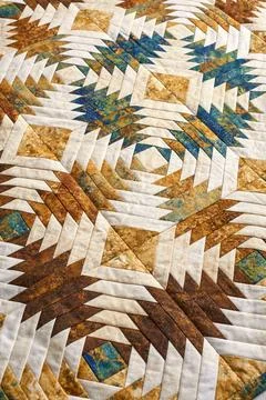Fragment of quilt stitched from pineapple pattern blocks, traditional patchwo Stock Photos