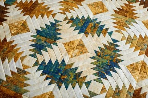 Fragment of quilt stitched from pineapple pattern blocks, traditional patchwo Stock-Fotos