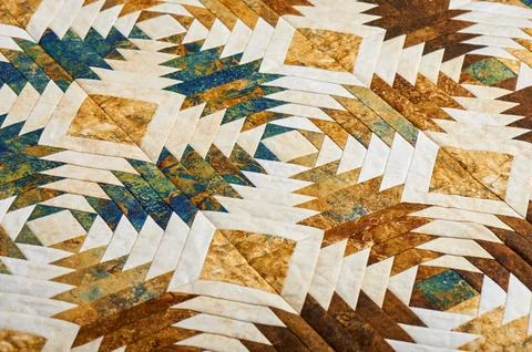Fragment of quilt stitched from pineapple pattern blocks, traditional patchwo Stock-Fotos