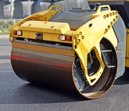 Fragment of road roller Stock Photos