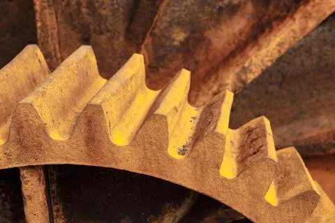 Fragment of a rusty gear Stock Photos